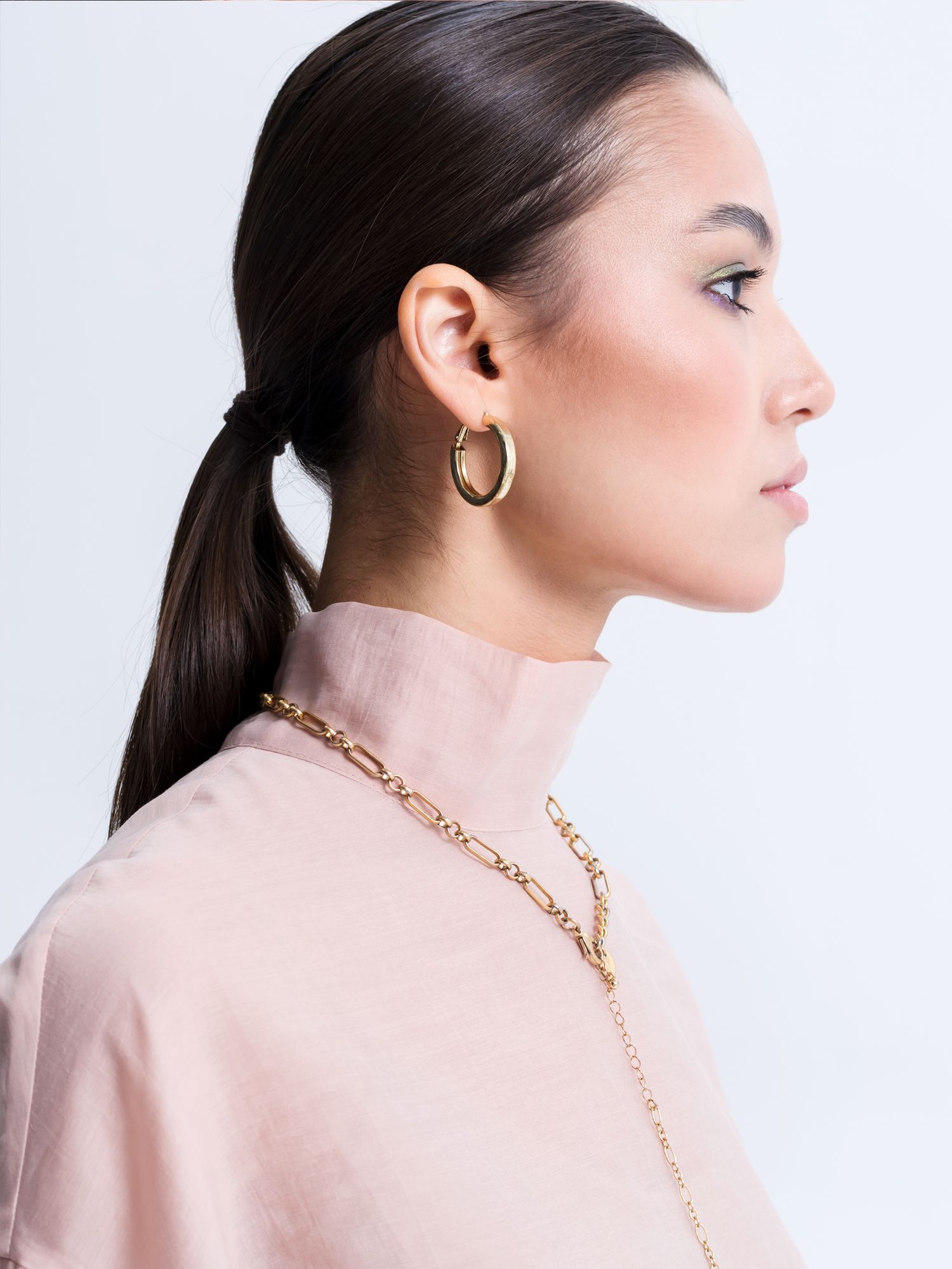 Model wearing gold hoop earrings — fine jewellery styling at Sage Thread Boutique Bangalore