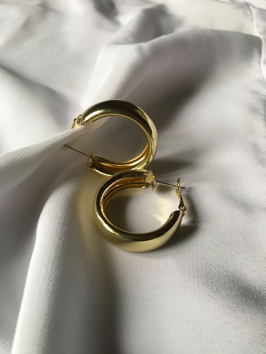 Gold hoop earrings on ivory silk — fine jewellery at Sage Thread Boutique Bangalore