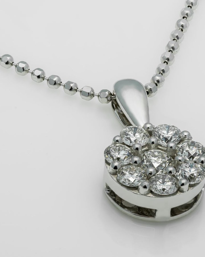 Round diamond cluster halo pendant necklace in white gold — fine jewellery at Sage Thread Boutique Bangalore